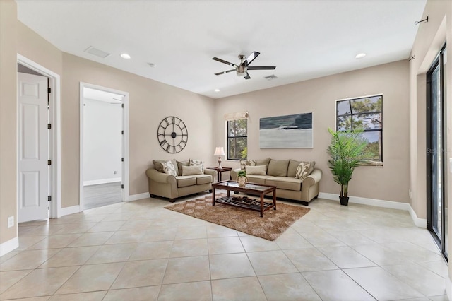 13503 22nd Ct E, Parrish, FL 34219 - living room with ceiling fan, recessed lighting, and light tile patterned flooring