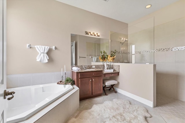 13503 22nd Ct E, Parrish, FL 34219 - full bathroom with a bath, tile patterned floors, walk in shower, and vanity