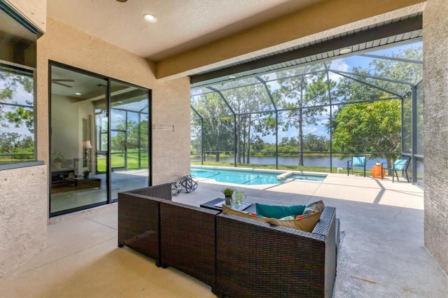 13503 22nd Ct E, Parrish, FL 34219 - view of patio featuring a water view, outdoor lounge area, a lanai, and a pool with connected hot tub