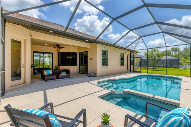 13503 22nd Ct E, Parrish, FL 34219 - view of pool featuring a patio, an outdoor hangout area, ceiling fan, a pool with connected hot tub, and glass enclosure