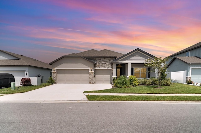 2108 Citrus Breeze Dr, Bradenton, FL 34208 - ranch-style house with a garage, a front lawn, driveway, stone siding, and oil tank