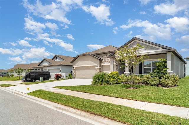 2108 Citrus Breeze Dr, Bradenton, FL 34208 - view of front of house with driveway, stone siding, a front yard, a garage, and stucco siding