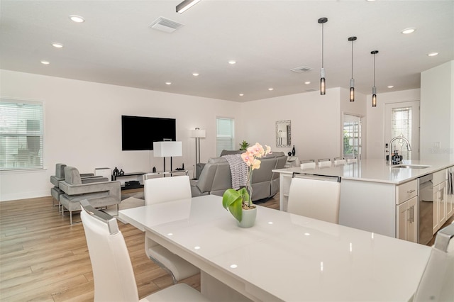 2108 Citrus Breeze Dr, Bradenton, FL 34208 - dining area with recessed lighting and light wood-type flooring