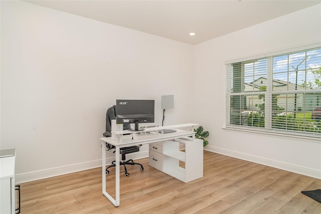 2108 Citrus Breeze Dr, Bradenton, FL 34208 - home office featuring light wood-style floors and recessed lighting