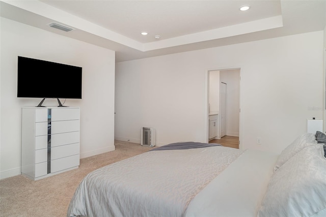 2108 Citrus Breeze Dr, Bradenton, FL 34208 - bedroom featuring light colored carpet, recessed lighting, and a raised ceiling