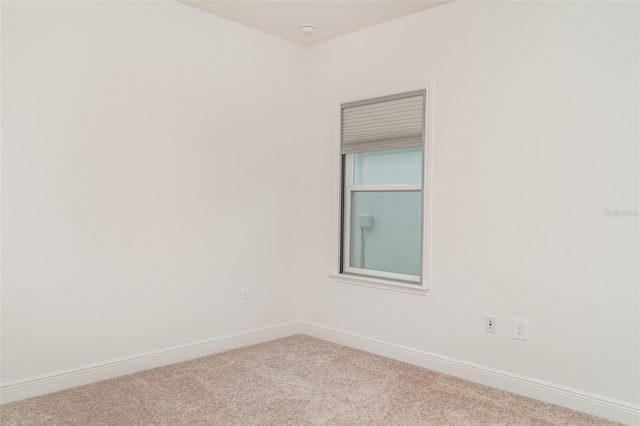 2108 Citrus Breeze Dr, Bradenton, FL 34208 - empty room with carpet flooring and a smoke detector