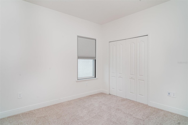 2108 Citrus Breeze Dr, Bradenton, FL 34208 - unfurnished bedroom with carpet and a closet