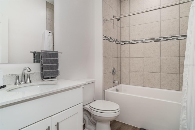 2108 Citrus Breeze Dr, Bradenton, FL 34208 - full bathroom featuring vanity, shower / bath combo, and wood finished floors