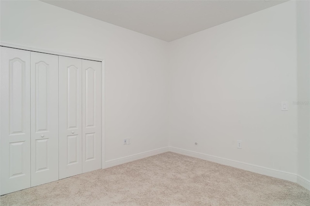 2108 Citrus Breeze Dr, Bradenton, FL 34208 - unfurnished bedroom with carpet floors and a closet