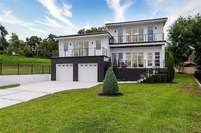 1841 Moorings Ct, Clermont, FL 34711 - view of front of house featuring a balcony, stairway, a garage, concrete driveway, and stucco siding