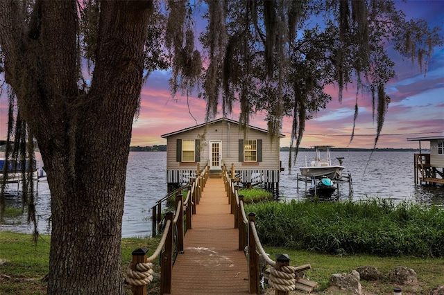 1841 Moorings Ct, Clermont, FL 34711 - dock featuring boat lift and a water view