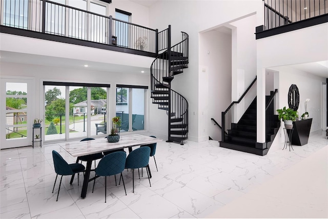 1841 Moorings Ct, Clermont, FL 34711 - dining space with a high ceiling, marble finish flooring, and stairs