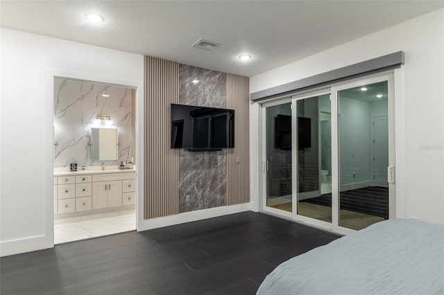 1841 Moorings Ct, Clermont, FL 34711 - bedroom with wood finished floors, recessed lighting, and connected bathroom