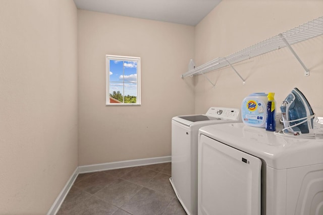 4617 Garden Arbor Way, Bradenton, FL 34203 - washroom featuring separate washer and dryer, baseboards, and dark tile patterned flooring