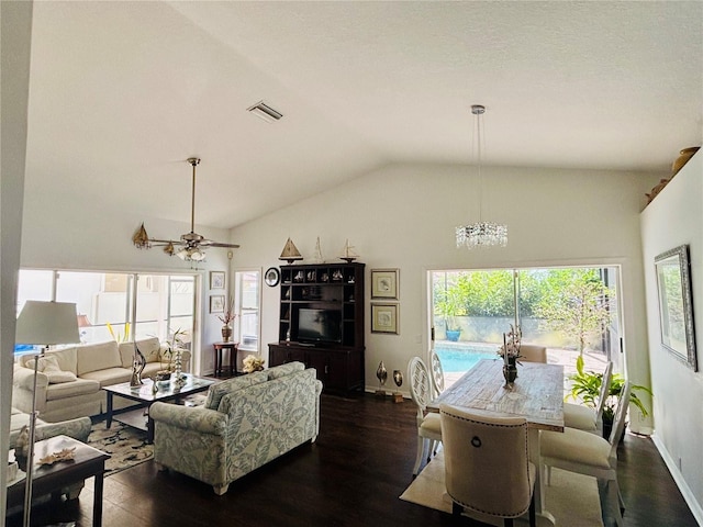 4907 Kilty Ct E, Bradenton, FL 34203 - living room with wood finished floors, a chandelier, lofted ceiling, and a ceiling fan