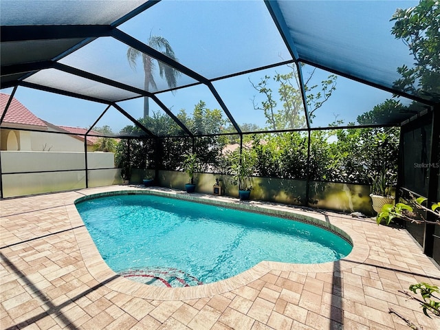 4907 Kilty Ct E, Bradenton, FL 34203 - view of swimming pool featuring a patio and glass enclosure