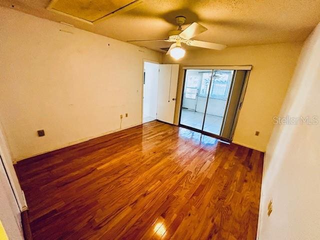 2607 29th Ave W, Bradenton, FL 34205 - empty room featuring wood finished floors, ceiling fan, and a textured ceiling