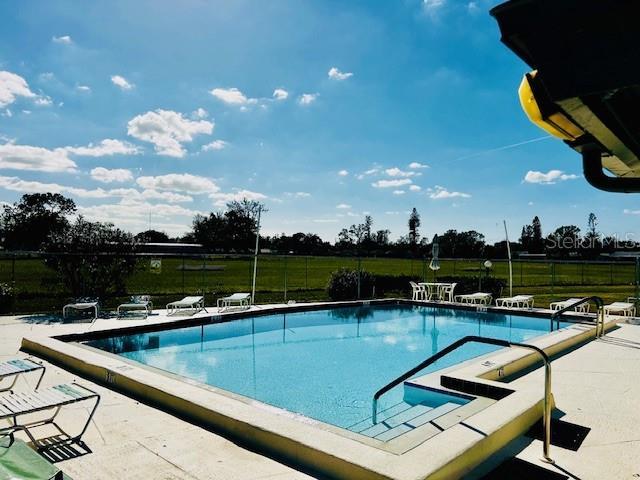 2607 29th Ave W, Bradenton, FL 34205 - community pool with a patio