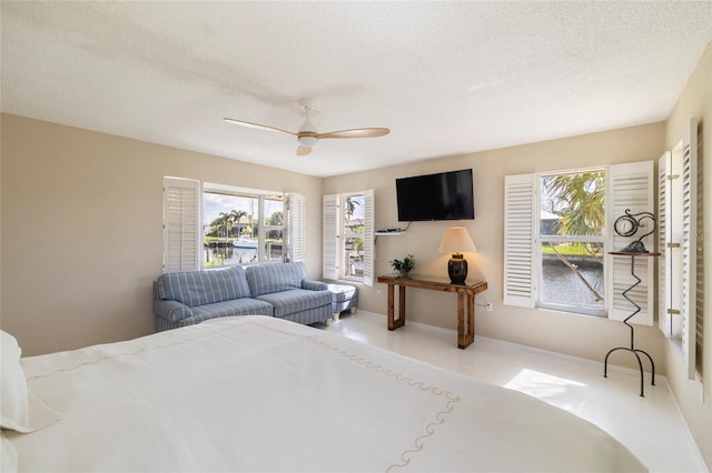2807 Coral Way, Punta Gorda, FL 33950 - bedroom with a textured ceiling and ceiling fan