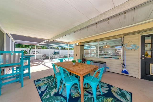5948 Mirror Lake Rd, Sarasota, FL 34238 - fenced backyard with a patio area and outdoor dining area