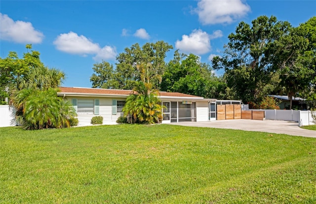 5948 Mirror Lake Rd, Sarasota, FL 34238 - rear view of property featuring a sunroom