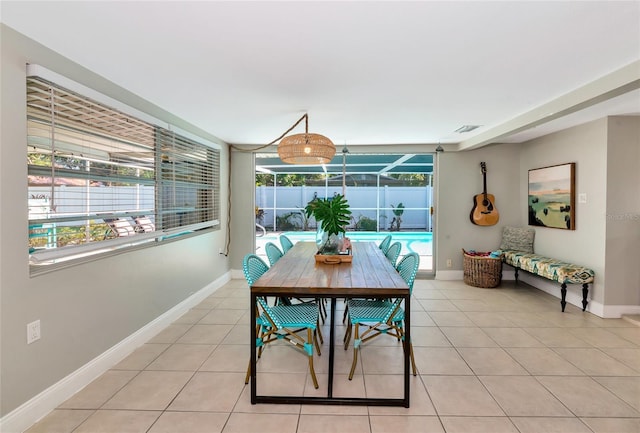 5948 Mirror Lake Rd, Sarasota, FL 34238 - dining area featuring light tile patterned flooring