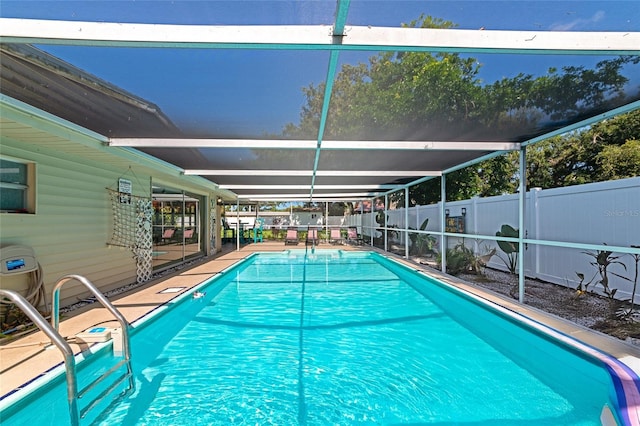 5948 Mirror Lake Rd, Sarasota, FL 34238 - view of pool featuring a fenced backyard, glass enclosure, and a patio area