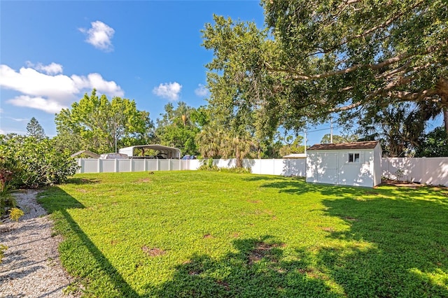 5948 Mirror Lake Rd, Sarasota, FL 34238 - fenced backyard with a storage unit