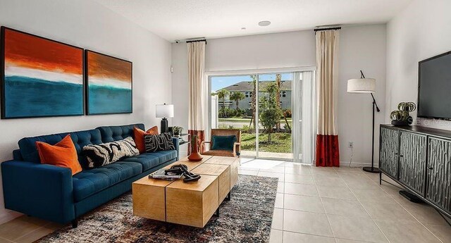 8697 Daybreak St, Sarasota, FL 34241 - living area featuring tile patterned floors and baseboards