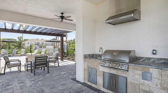 8697 Daybreak St, Sarasota, FL 34241 - view of patio / terrace featuring outdoor dining area, a ceiling fan, a sink, and a pergola