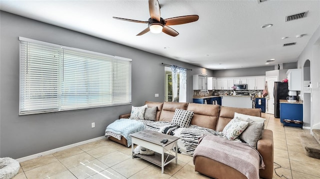 8804 Founders Cir, Palmetto, FL 34221 - living area featuring a ceiling fan, light tile patterned floors, and recessed lighting