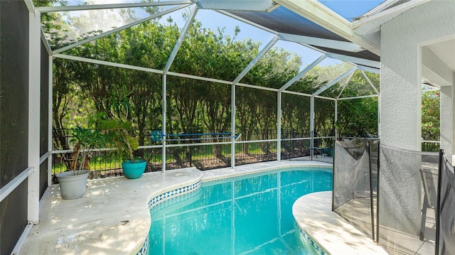 8804 Founders Cir, Palmetto, FL 34221 - view of swimming pool with a patio area and glass enclosure