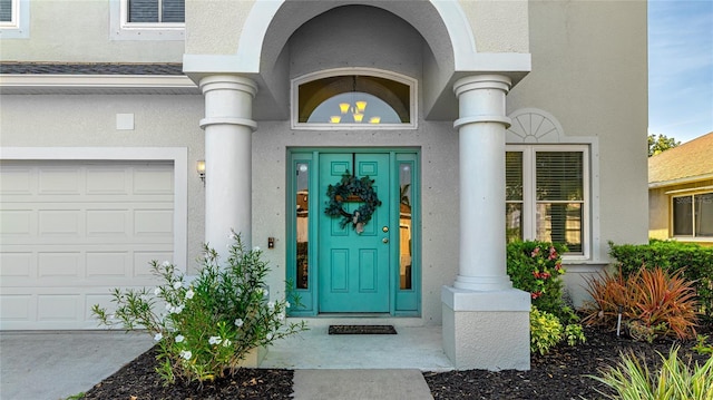 8804 Founders Cir, Palmetto, FL 34221 - property entrance featuring stucco siding