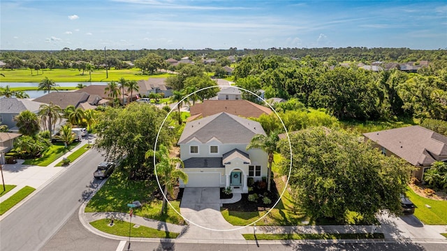8804 Founders Cir, Palmetto, FL 34221 - aerial view of residential area with a nearby body of water and a tree filled landscape