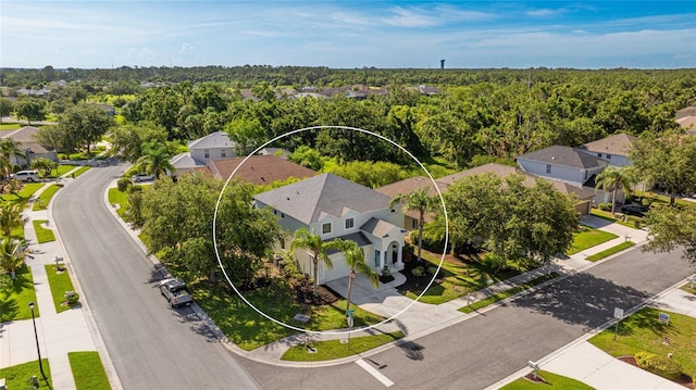 8804 Founders Cir, Palmetto, FL 34221 - aerial view of residential area featuring a heavily wooded area