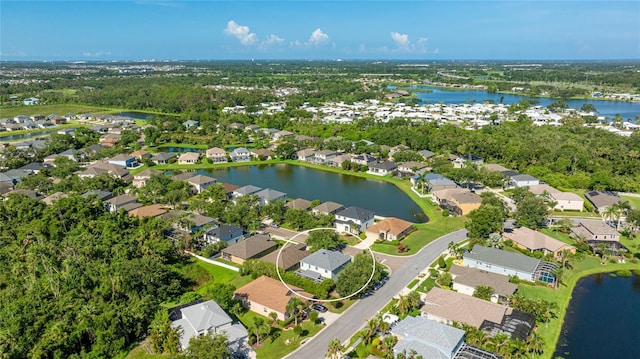 8804 Founders Cir, Palmetto, FL 34221 - aerial perspective of suburban area featuring a nearby body of water