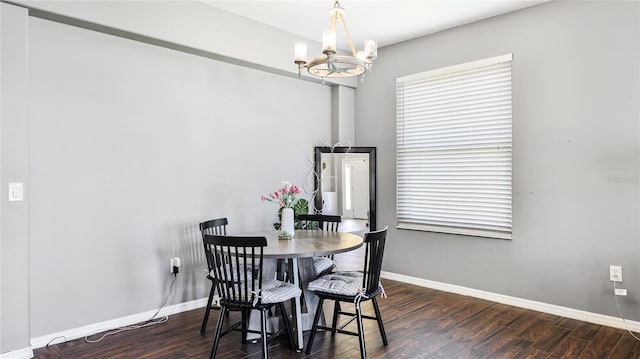 8804 Founders Cir, Palmetto, FL 34221 - dining room with a chandelier and wood finished floors