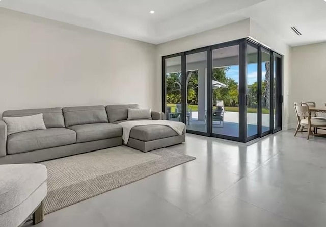 289 Long Meadow Ln, Rotonda West, FL 33947 - living area with recessed lighting and finished concrete floors