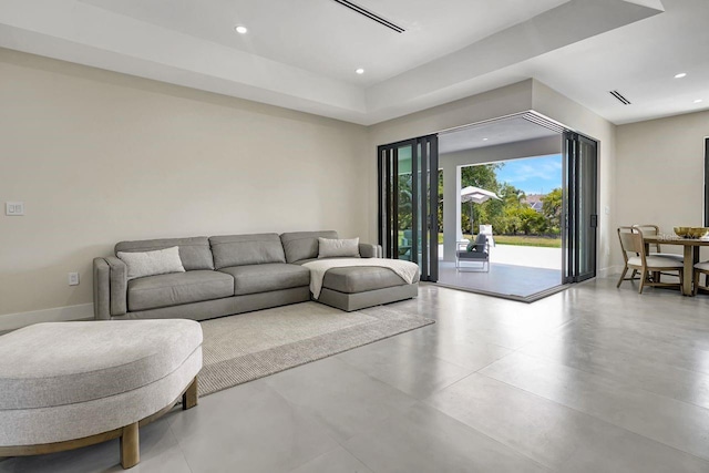 289 Long Meadow Ln, Rotonda West, FL 33947 - living area with recessed lighting, concrete flooring, and baseboards