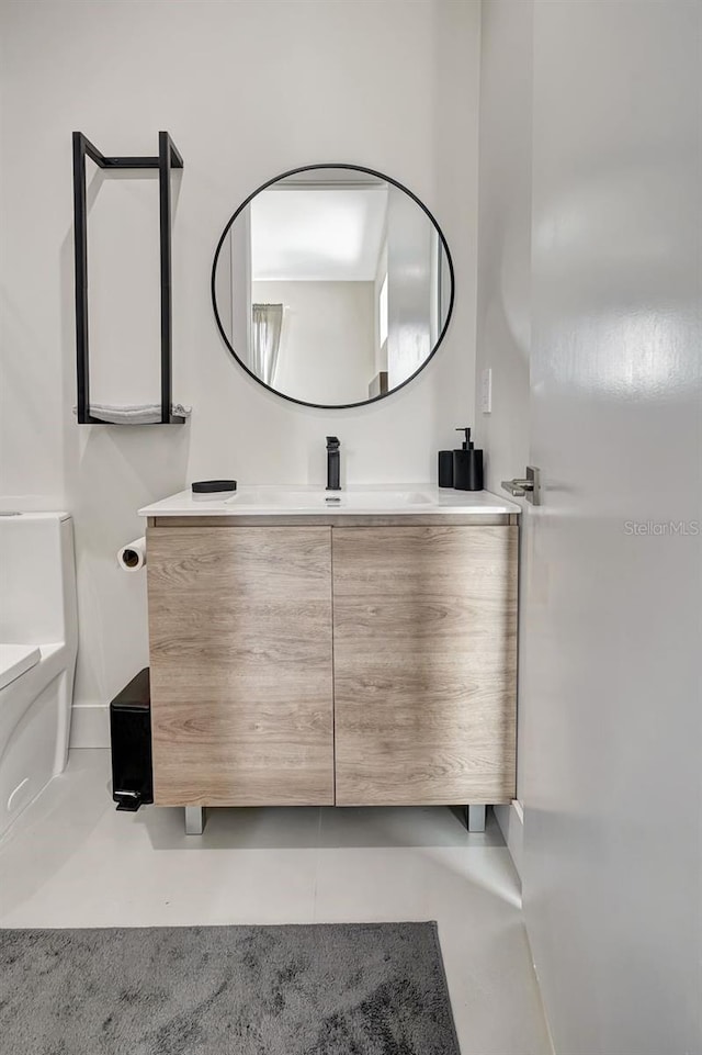 289 Long Meadow Ln, Rotonda West, FL 33947 - bathroom featuring vanity and toilet