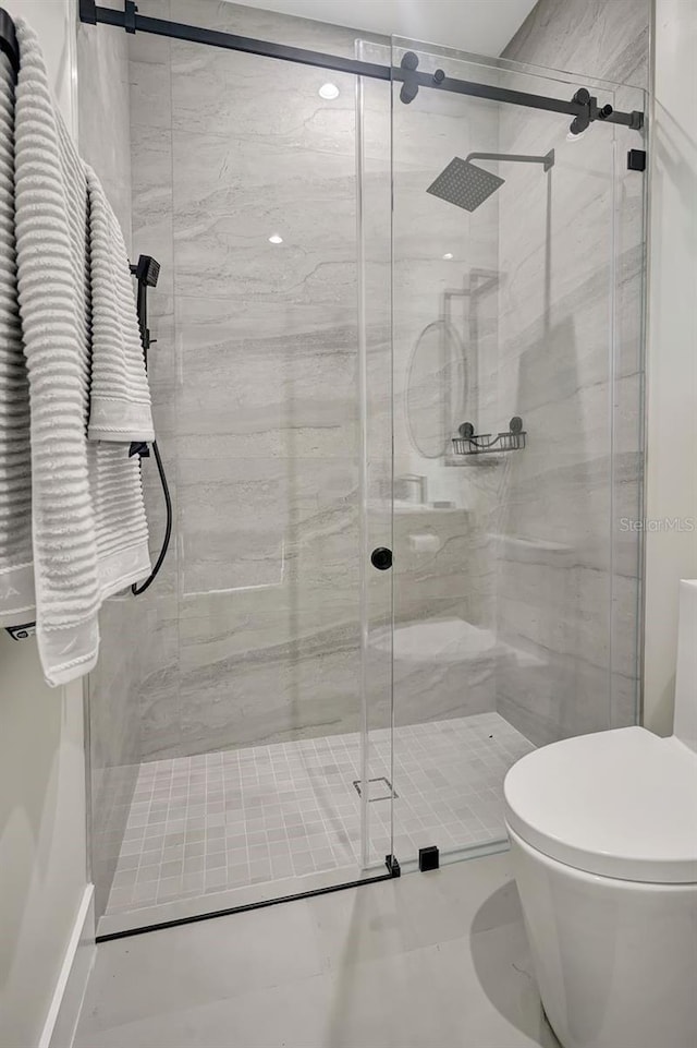 289 Long Meadow Ln, Rotonda West, FL 33947 - bathroom featuring toilet and a shower stall