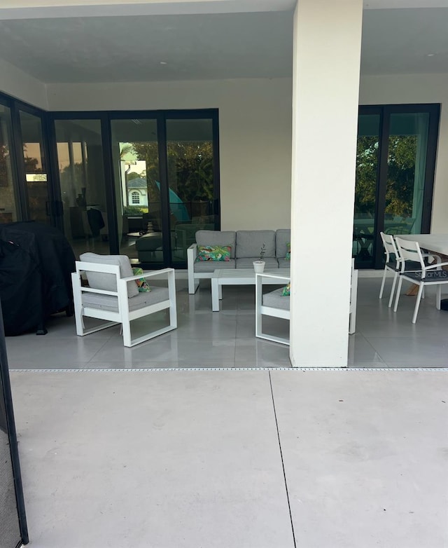 289 Long Meadow Ln, Rotonda West, FL 33947 - view of patio with an outdoor living space, french doors, and area for grilling