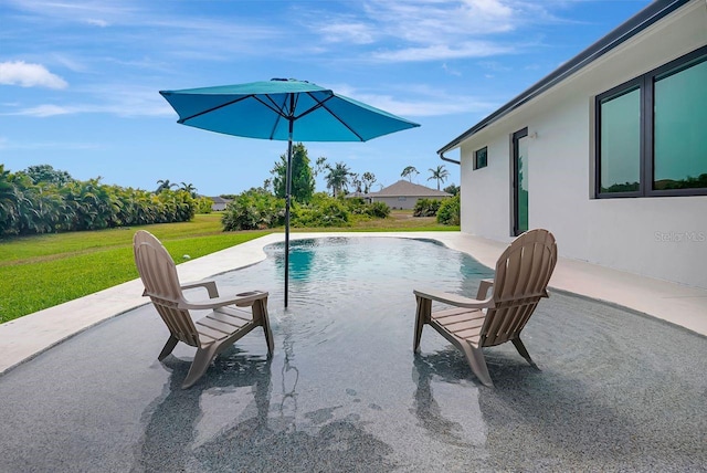 289 Long Meadow Ln, Rotonda West, FL 33947 - swimming pool with a patio area and a lawn