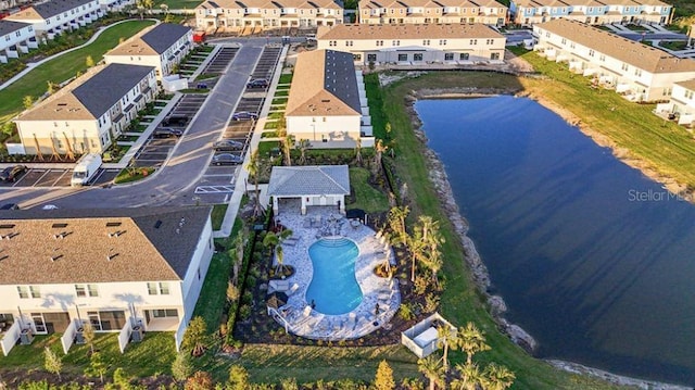 8689 Daybreak St, Sarasota, FL 34241 - aerial perspective of suburban area featuring a pool area and a nearby body of water