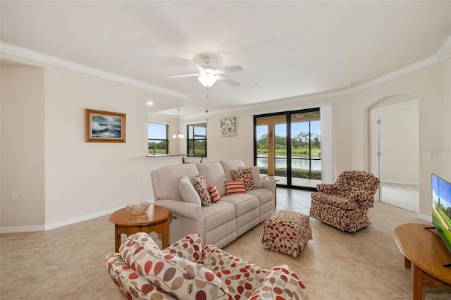 6923 Grand Estuary Trl Unit 101, Bradenton, FL 34212 - living room with crown molding, light tile patterned floors, and a ceiling fan