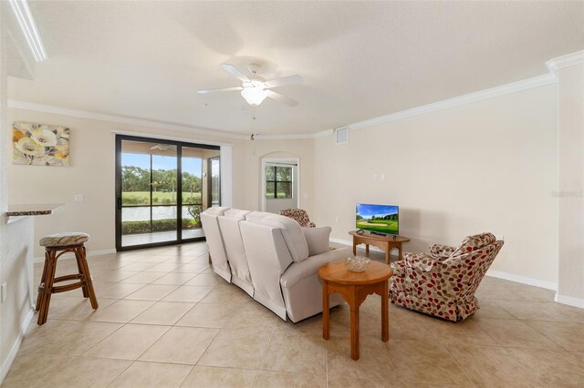 6923 Grand Estuary Trl Unit 101, Bradenton, FL 34212 - living room with ornamental molding, light tile patterned floors, and a ceiling fan