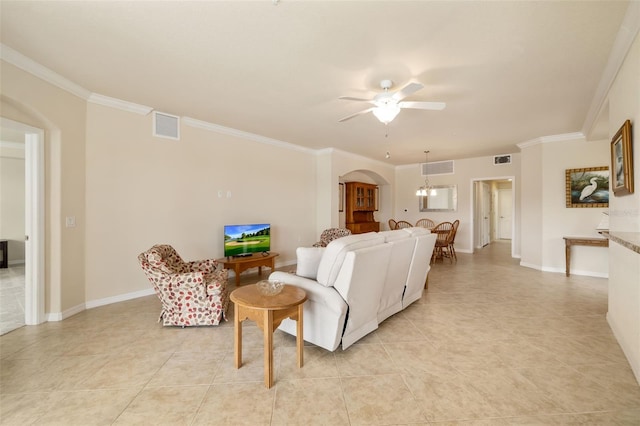 6923 Grand Estuary Trl Unit 101, Bradenton, FL 34212 - living area featuring arched walkways, crown molding, ceiling fan, light tile patterned floors, and a chandelier