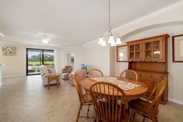 6923 Grand Estuary Trl Unit 101, Bradenton, FL 34212 - dining area with ornamental molding, ceiling fan, a chandelier, and light tile patterned flooring