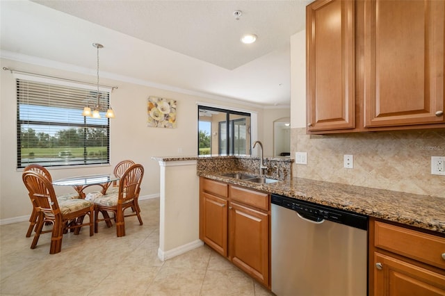 6923 Grand Estuary Trl Unit 101, Bradenton, FL 34212 - kitchen featuring dishwasher, dark stone countertops, tasteful backsplash, a chandelier, and ornamental molding