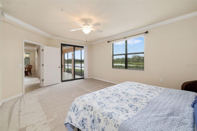 6923 Grand Estuary Trl Unit 101, Bradenton, FL 34212 - bedroom with access to outside, crown molding, light colored carpet, multiple windows, and a ceiling fan